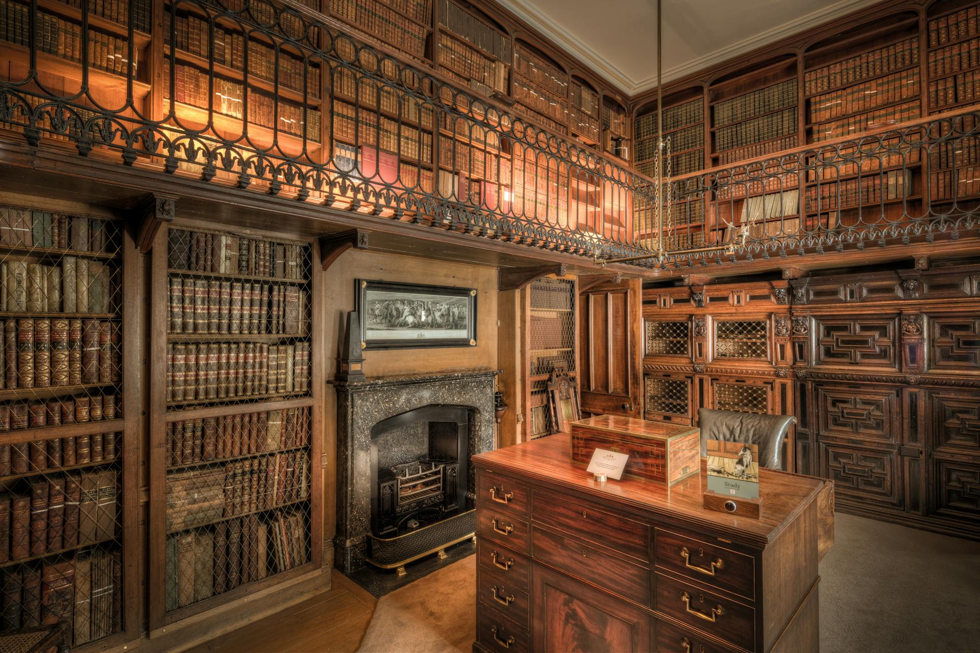 A historic library in Scotland featuring extensive wooden bookshelves filled with books.